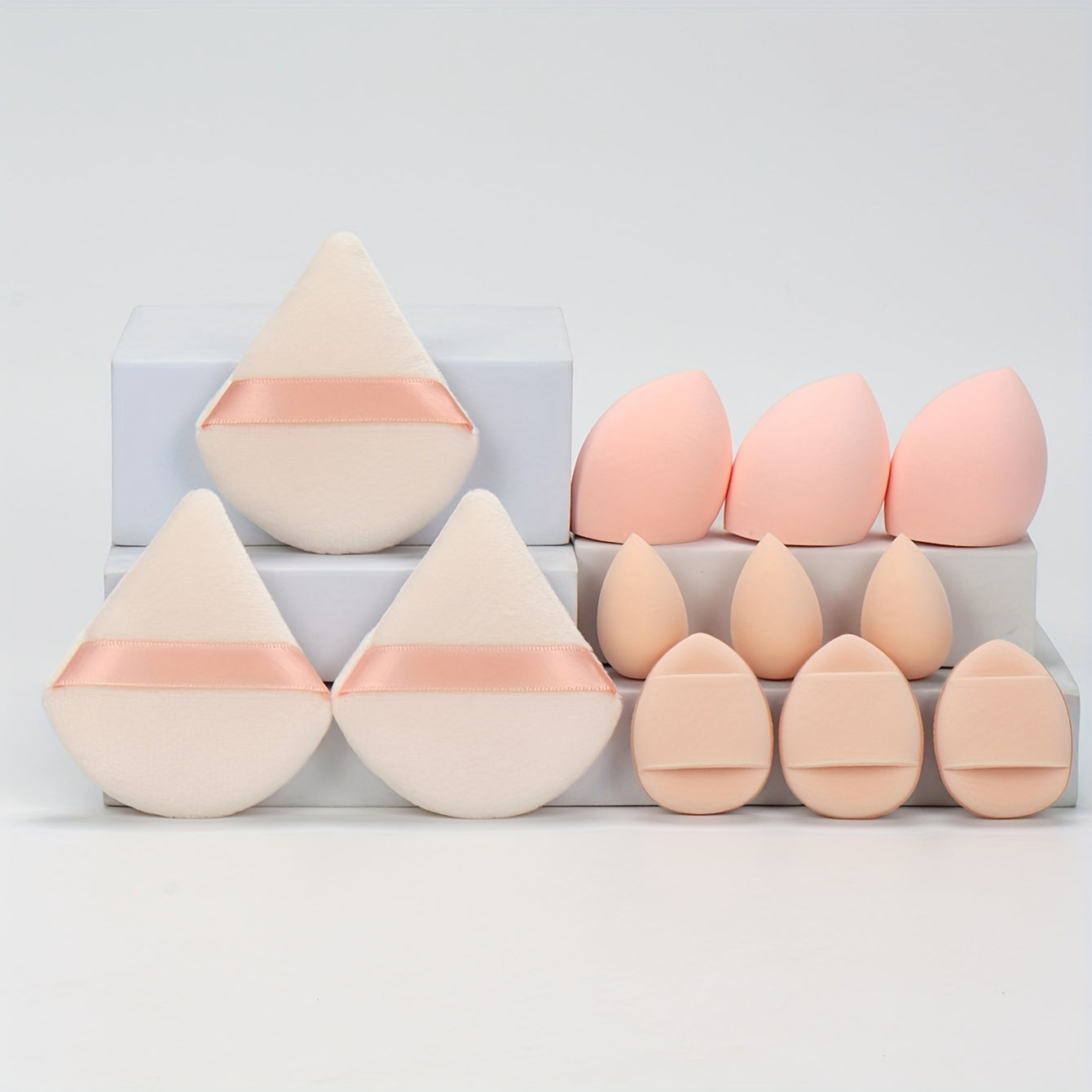 All-in-one 12pack/8pack makeup sponge set, consisting of 3 loose powder puffs, 3 mini air cushion puffs, 3 makeup sponges and 3 mini makeup sponges /or makeup puff& brush 8pcs set. Does not contain latex, does not easily eat