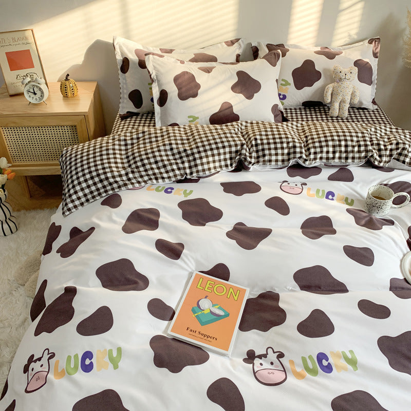 Four-Piece Cute Cartoon Bed Sheet Set: Add a touch of fun and whimsy to your bedroom with these adorable cartoon-themed sheets