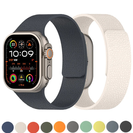 Apple Watch magnetic silicone strap band for Series 11-8 SE Ultra 3/2, adjustable, in black with textured design.