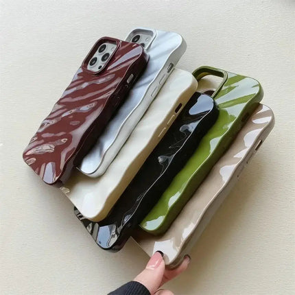 Glossy 3D wave plating iPhone case by OKEYWOW for iPhone 11 to 13 Pro Max, shockproof soft cover with vibrant design.