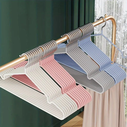 Set of 20/30 heavy-duty metal clothes hangers with anti-slip design for space-saving closet organization by OKEYWOW.