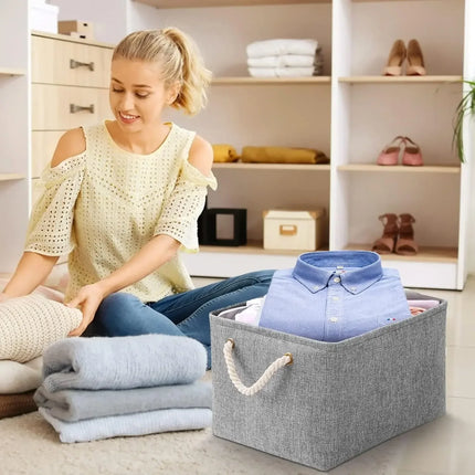 OKEYWOW multi-purpose storage basket for laundry, toys, clothes, socks, and books, made of durable fabric with handles.