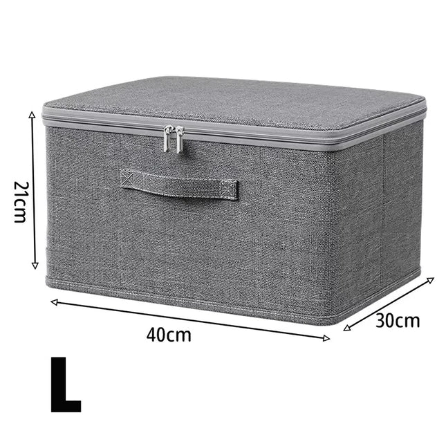 Foldable OKEYWOW large capacity clothes storage box with zipper, used as wardrobe organizer bag for clothing and accessories.
