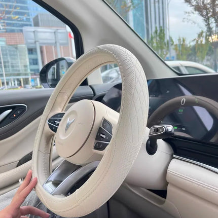 OKEYWOW Napa leather 15-inch universal steering wheel cover with perforated, breathable, non-slip design for car wheel protection.
