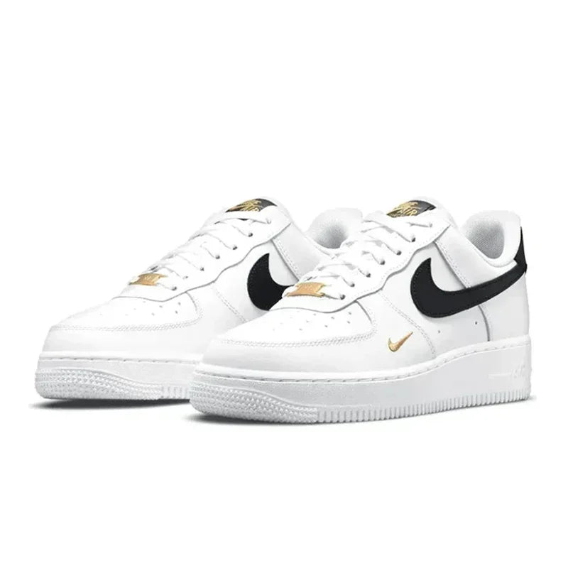 Nike Air Force 1 Low Skateboarding Shoes: Comfortable unisex sneakers available for both men and women. Classic white and black design for versatile style.