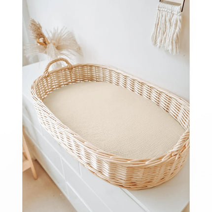 Soft white muslin cotton baby fitted sheet from OKEYWOW, breathable, solid color crib sheet for newborns and infants.