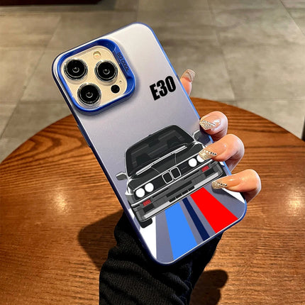 OKEYWOW iPhone E30 car case with laser-etched design, shockproof PC and TPU cover for iPhone 11 to 16 Pro Max XR XS models.