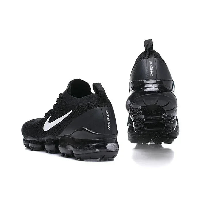 Original Nike Air VaporMax 3.0 2019: Featuring atmospheric cushioning, these wild jogging shoes are available in Women's sizes 36-39. Black and white colorway with hook design (AJ6900-001).