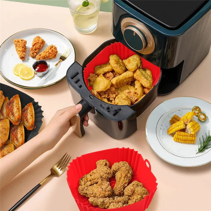 Reusable silicone air fryer pan liner from okeyWOW, non-stick tray for oven baking, pizza, chicken, and roasting accessories.