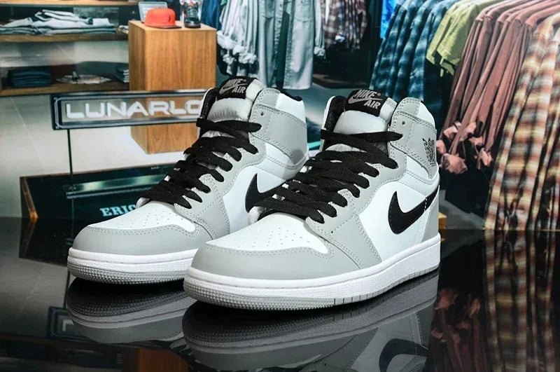 Nike Air Jordan 1 Mid Basketball Shoes: Versatile for men and women, these sneakers offer breathability and style, perfect for both basketball and casual wear.