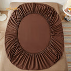 OKEYWOW cotton fitted sheet with elastic edge for single, double, queen, and king beds, showing a snug fit on a mattress.