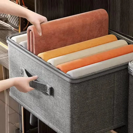 Large capacity OKEYWOW foldable clothes storage box with zipper for wardrobe organization, shown in a clean, open state.