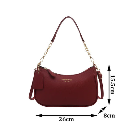 Luxury Cherry Pendant Shoulder Bag by OKEYWOW, soft lychee material, casual dumpling style underarm handbag for women.