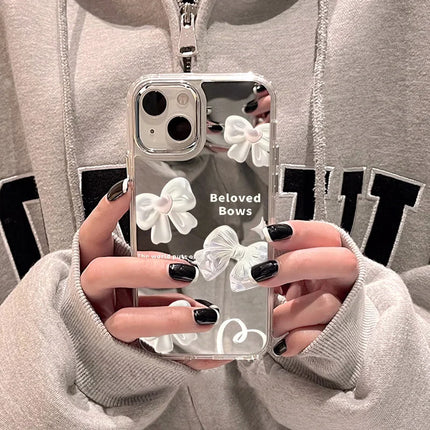 Luxury shockproof Mirror Bowknot iPhone case for iPhone 17 to 11 Pro Max XR XS by OKEYWOW, featuring a shiny bowknot design.
