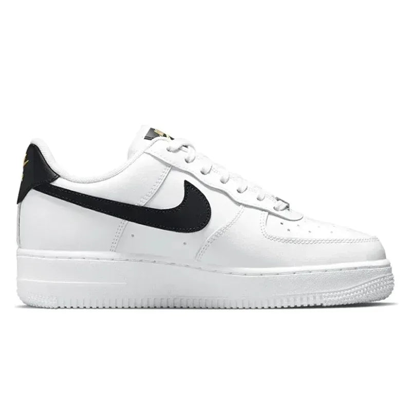 Nike Air Force 1 Low Skateboarding Shoes: Comfortable unisex sneakers available for both men and women. Classic white and black design for versatile style.