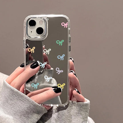 Luxury shockproof iPhone case with mirror bowknot design for iPhone 11 Pro Max, XR, XS by OKEYWOW, featuring stylish protection.