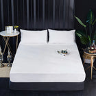 OKEYWOW waterproof fitted bed sheet with elastic edges and anti-slip design on a mattress in various sizes including single, double, queen, and king.