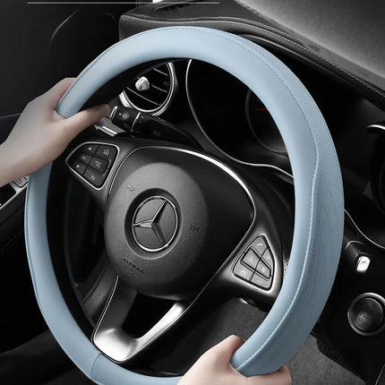 Okeywow Napa leather 15-inch universal steering wheel cover with perforated, breathable, non-slip design for car wheel protection.