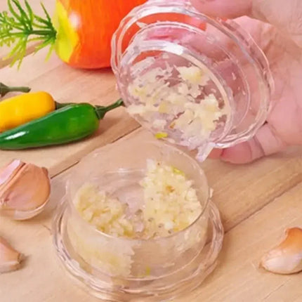 OKEYWOW manual garlic press and chopper kitchen gadget for crushing garlic and chopping herbs, compact home appliance accessory.