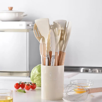 Set of 12 OKEYWOW silicone kitchen utensils with non-stick spatulas and wooden handles for versatile cooking and baking.
