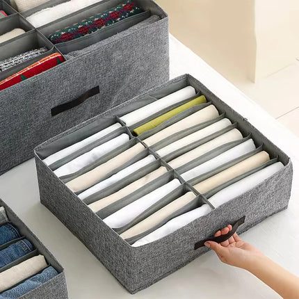 OKEYWOW clothes organizer storage box with compartments for pants, sweaters, and T-shirts in a wardrobe drawer.