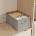 OKEYWOW jeans and underwear storage organizer box with dividers for bras, socks, and clothing, fitting neatly in wardrobe drawers.