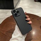 OKEYWOW iPhone carbon fiber case, ultra-thin hard back cover with camera protection, fits 11 to 17 Pro Max models.