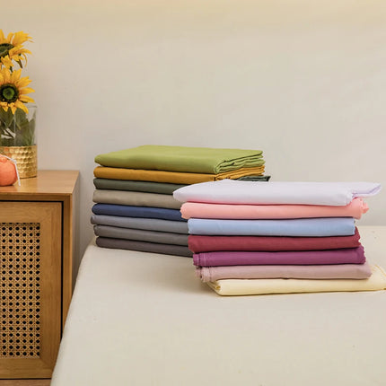 Light blue solid color single bed sheet from OKEYWOW, machine washable dormitory bedding linen with no pillowcase included.