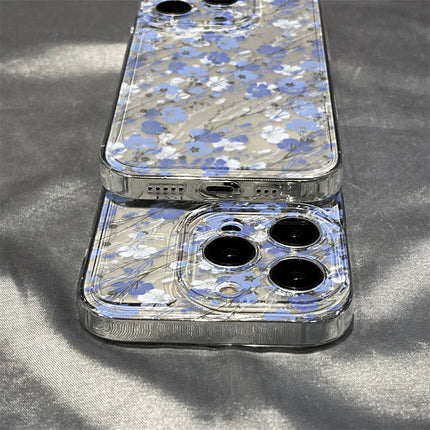 Clear shockproof iPhone case with colorful flower design for iPhone 11 to 17 by OKEYWOW, showing the protective cover on the phone.