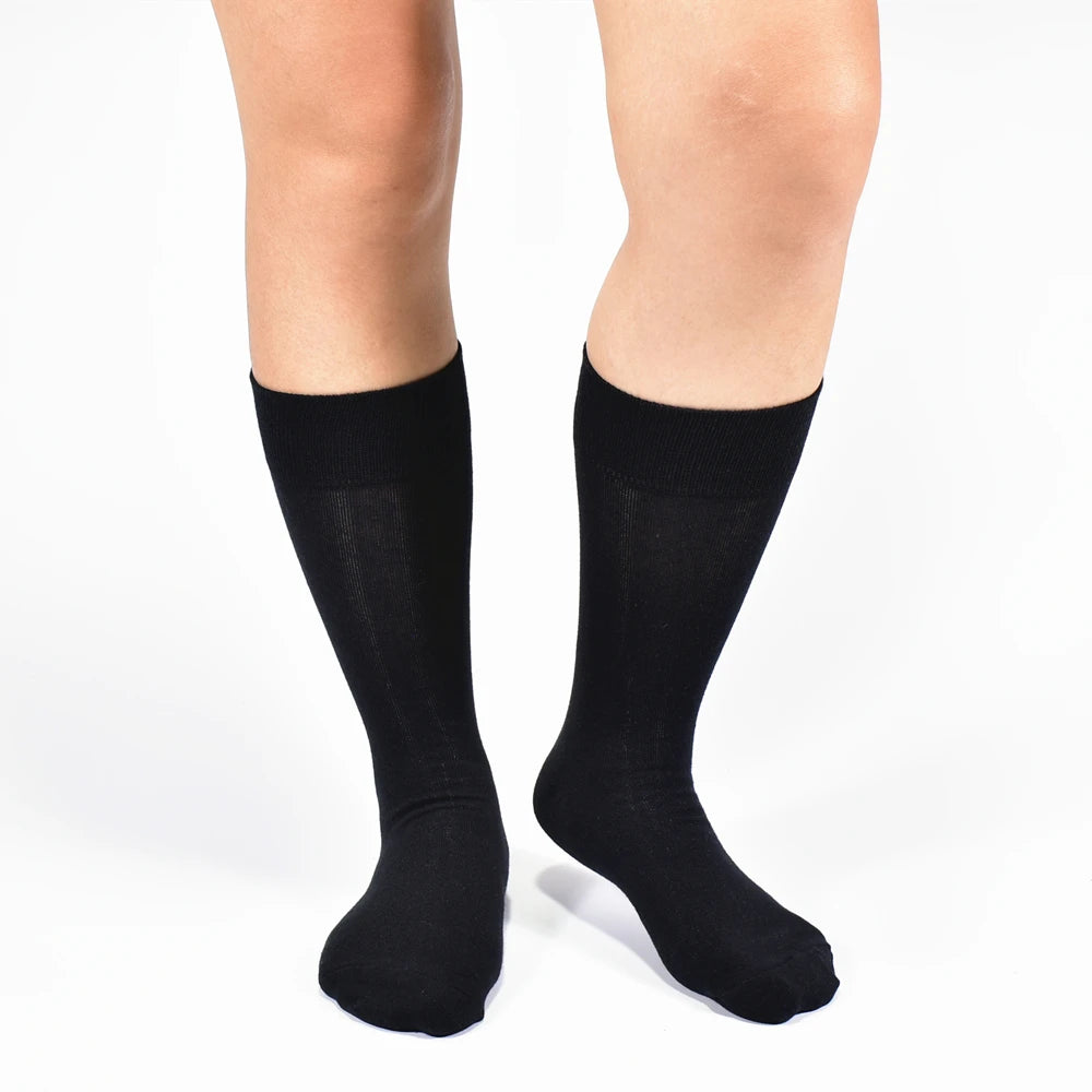 6 pairs of High-Quality Black Cotton Dress Socks: Designed for both men and women, these long calf socks are sweat-resistant and anti-odor, perfect for autumn and winter wear.