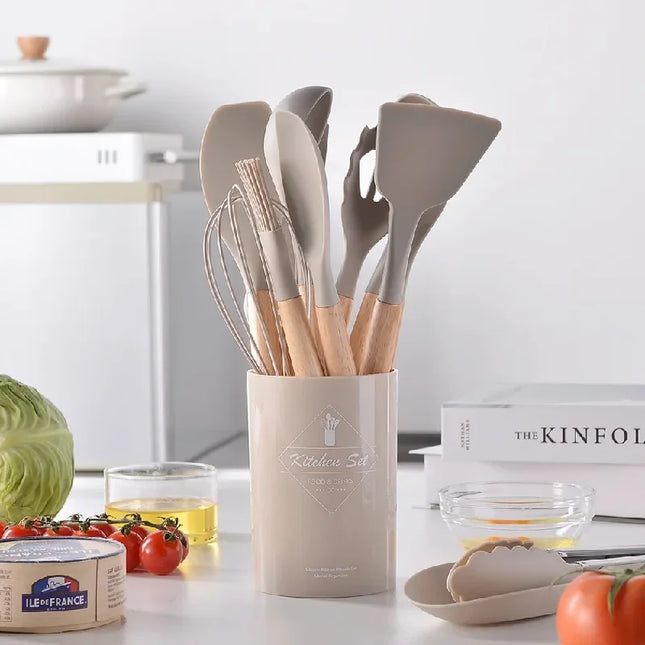 Set of 12 silicone kitchen utensils with non-stick spatulas and wooden handles from OKEYWOW for cooking and baking.