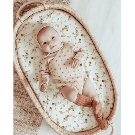 Soft muslin cotton baby fitted sheet from OKEYWOW, breathable solid color crib sheet for newborns, fits standard cribs comfortably.