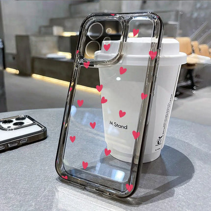 Clear heart-shaped shockproof iPhone case for models 11 to 15, soft and durable cover by OKEYWOW.