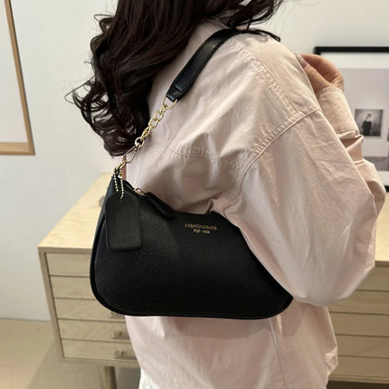 Luxury cherry pendant shoulder bag by OKEYWOW featuring soft lychee leather, casual underarm dumpling design, women’s handbag.