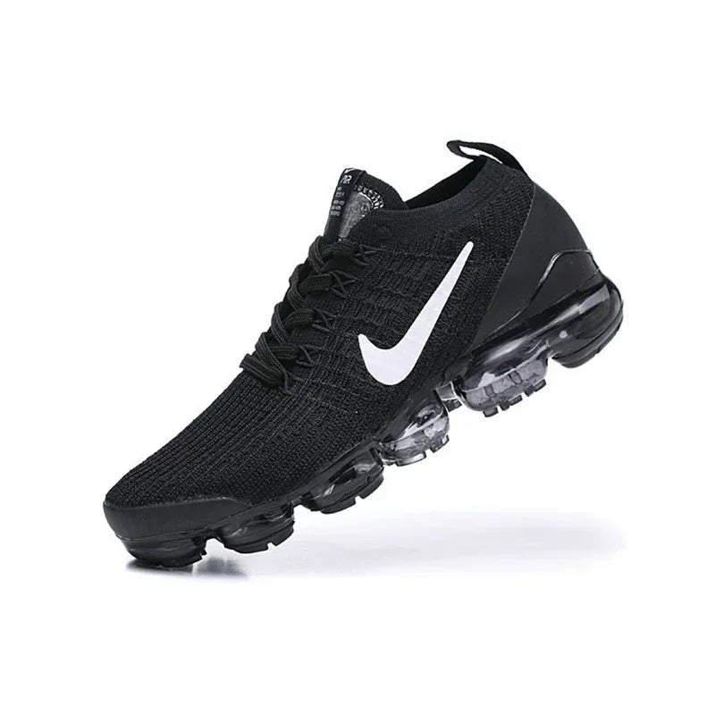 Original Nike Air VaporMax 3.0 2019: Featuring atmospheric cushioning, these wild jogging shoes are available in Women's sizes 36-39. Black and white colorway with hook design (AJ6900-001).