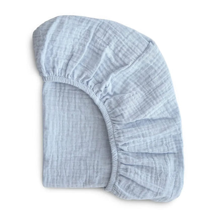 Soft, breathable muslin cotton baby fitted sheet in solid color, designed for crib beds by OKEYWOW.