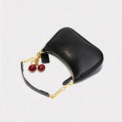 OKEYWOW cherry pendant shoulder bag for women, soft lychee leather casual dumpling underarm handbag with elegant design.