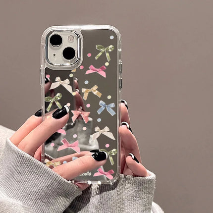 Luxury shockproof Mirror Bowknot iPhone case for iPhone 11 Pro Max XR XS by OKEYWOW, featuring a reflective surface and elegant design.