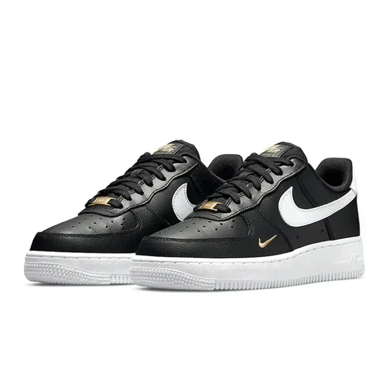 Nike Air Force 1 Low Skateboarding Shoes: Comfortable unisex sneakers available for both men and women. Classic white and black design for versatile style.