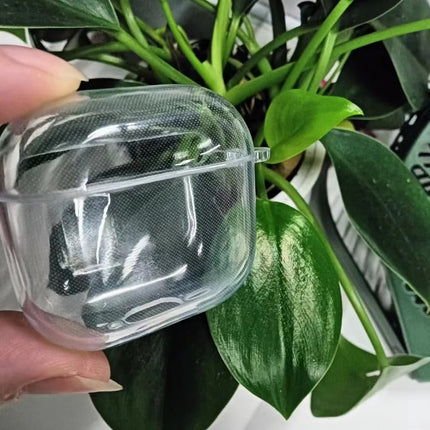 Transparent TPU case for AirPods 4th Gen by OKEYWOW, showing a clear protective cover fitted on the earphones.