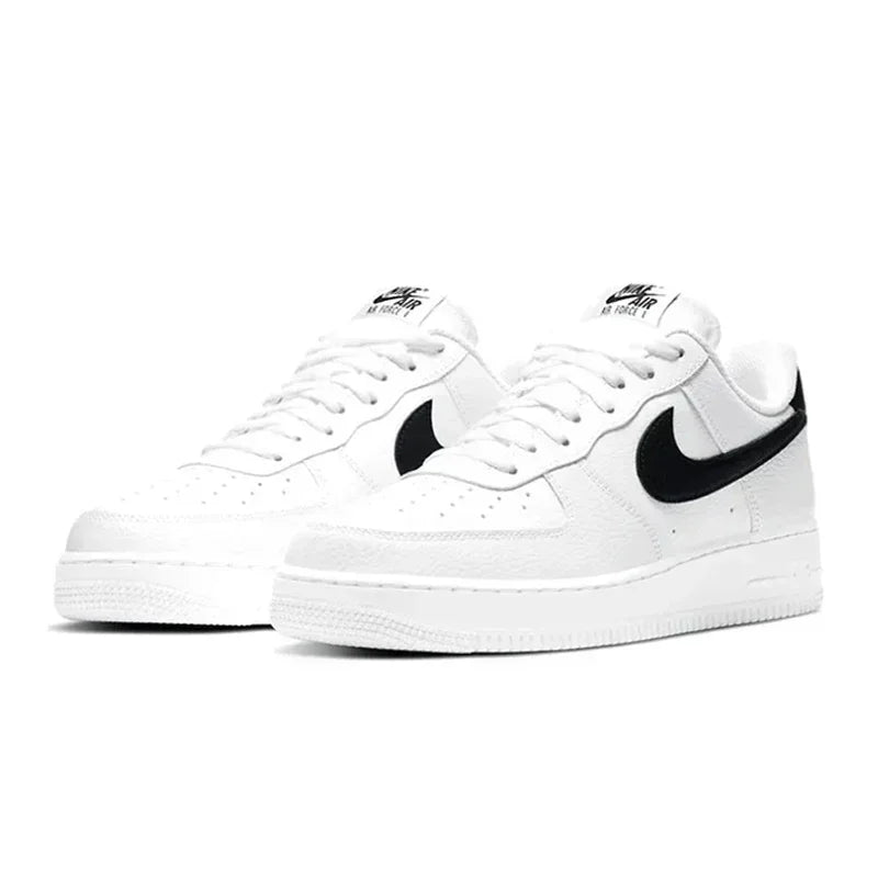 Nike Air Force 1 Low Skateboarding Shoes: Comfortable unisex sneakers available for both men and women. Classic white and black design for versatile style.