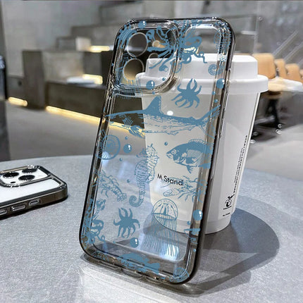 Clear silicone iPhone case with ocean animal design featuring sharks, dolphins, and fish for models 11 to 16 Pro Max by OKEYWOW