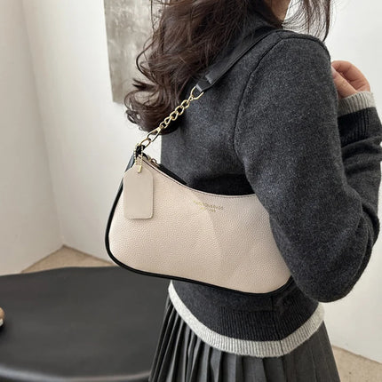 Luxury Cherry Pendant Shoulder Bag for women by OKEYWOW, soft lychee material, casual underarm dumpling handbag with elegant design.