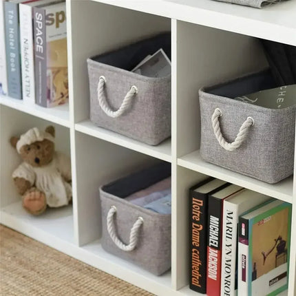 OKEYWOW multi-purpose storage basket for laundry, toys, clothes, socks, and books, made of durable fabric with handles.