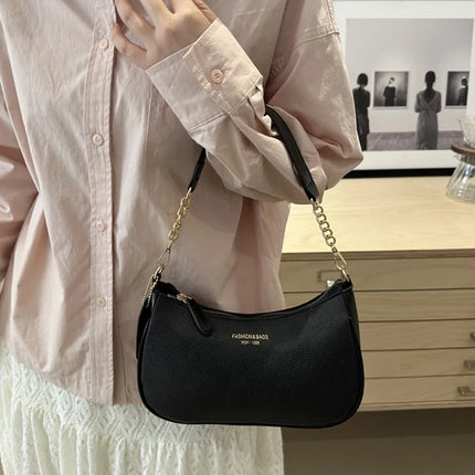 Luxury OKEYWOW cherry pendant shoulder bag with soft lychee texture, casual underarm dumpling style for women.