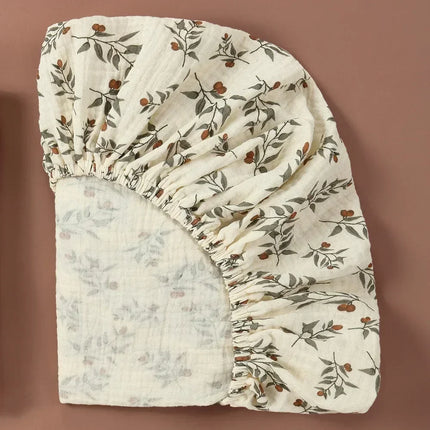 Breathable muslin cotton baby fitted sheet in solid color, suitable for crib beds, by OKEYWOW.