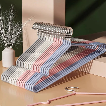 Set of 20/30 metal clothes hangers by OKEYWOW, anti-slip, heavy-duty, space-saving closet hangers for organized wardrobes.