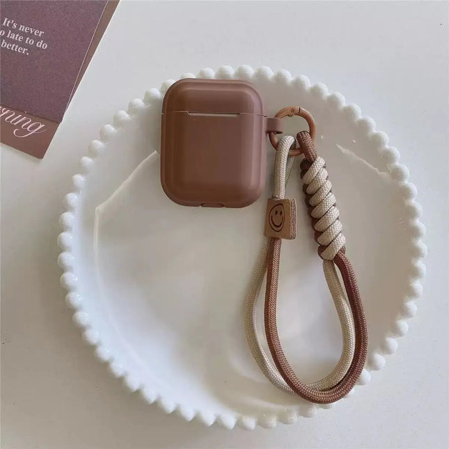 OKEYWOW AirPods silicone case with smile strap for AirPods 1/2/3/Pro/4, providing protection and a cheerful accessory.