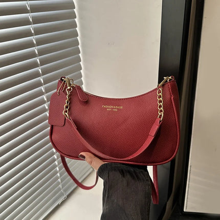 Luxury cherry-shaped shoulder bag by OKEYWOW, soft lychee texture, casual underarm dumpling handbag for women.