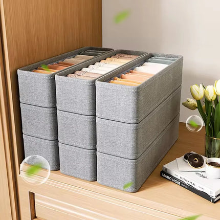 OKEYWOW drawer storage organizer box for t-shirts, jeans, underwear, and pants, shown in a tidy wardrobe setup.